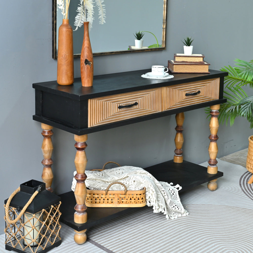 Angled view of the two-drawer console showing its turned legs and open lower shelf.