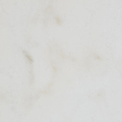 Close view of the Bordeaux console pale veined marble-look tabletop surface