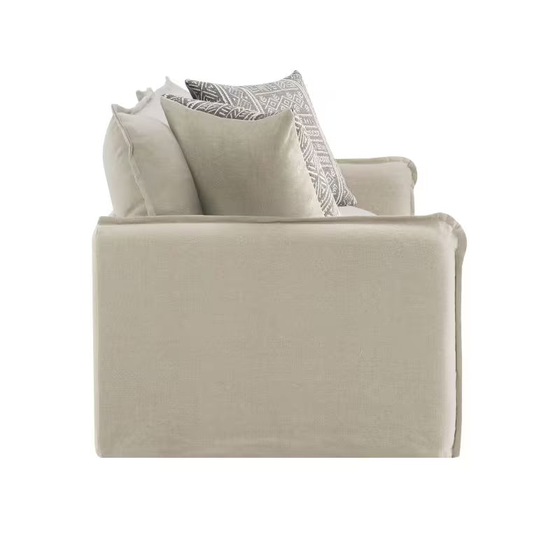 Beige Sofa, Loveseat and Swivel Chair Set — seating side profile and pillows.
