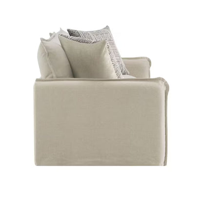 Beige Sofa, Loveseat and Swivel Chair Set — seating side profile and pillows.
