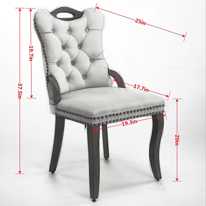 Beige velvet dining chair with a tufted back, wood handle, and curved wood legs