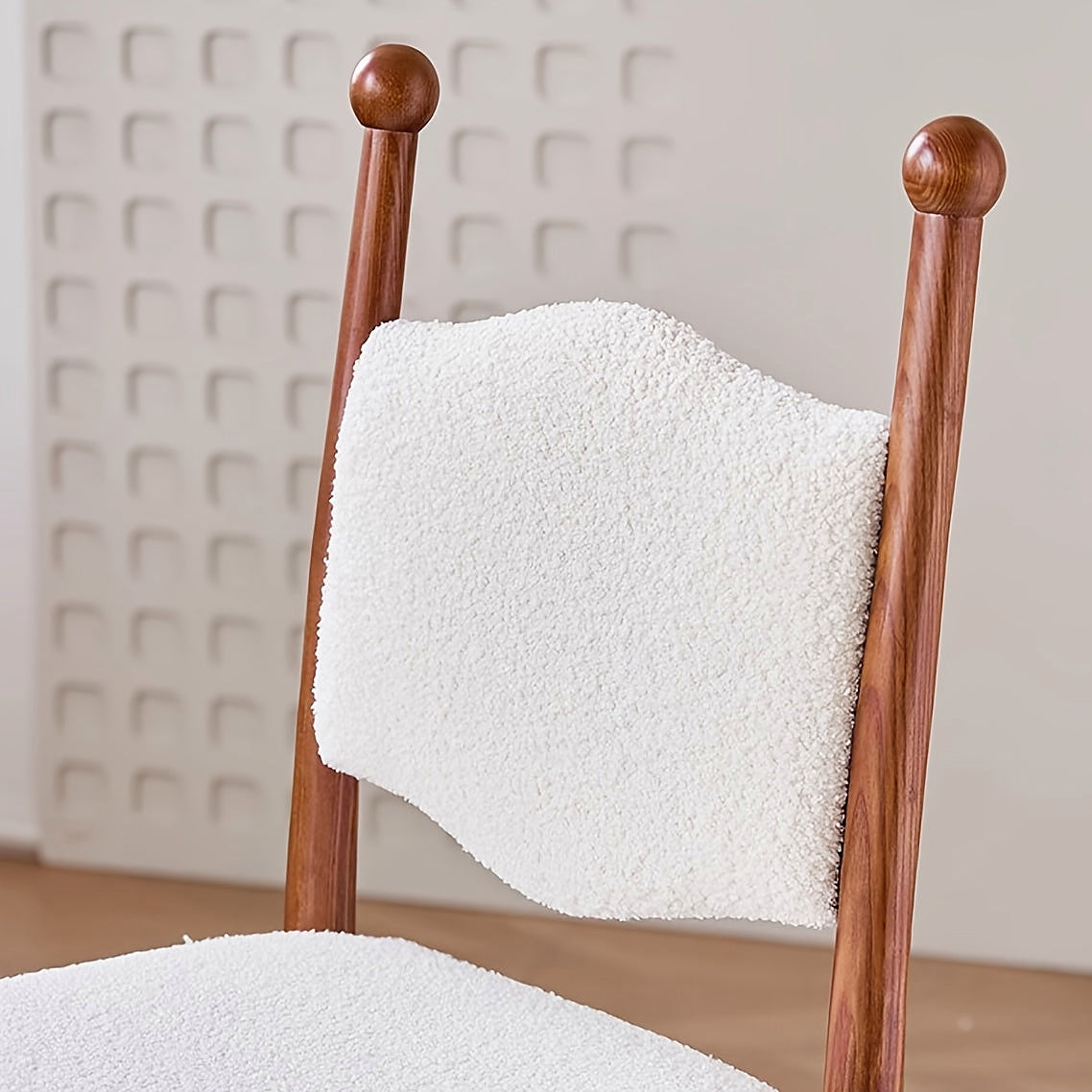 Ivory textured dining chair with a turned wood frame