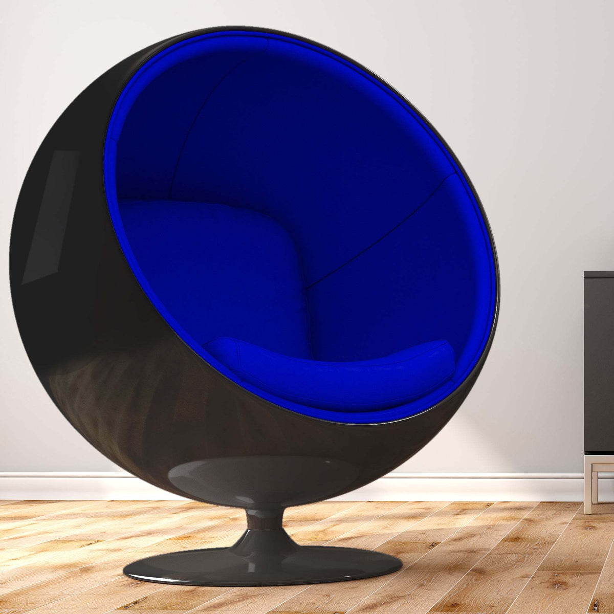 Black-shell blue-lined Globe chair in room