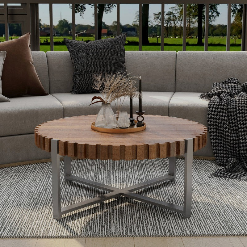 Front view of notched-edge round coffee table beside a sectional