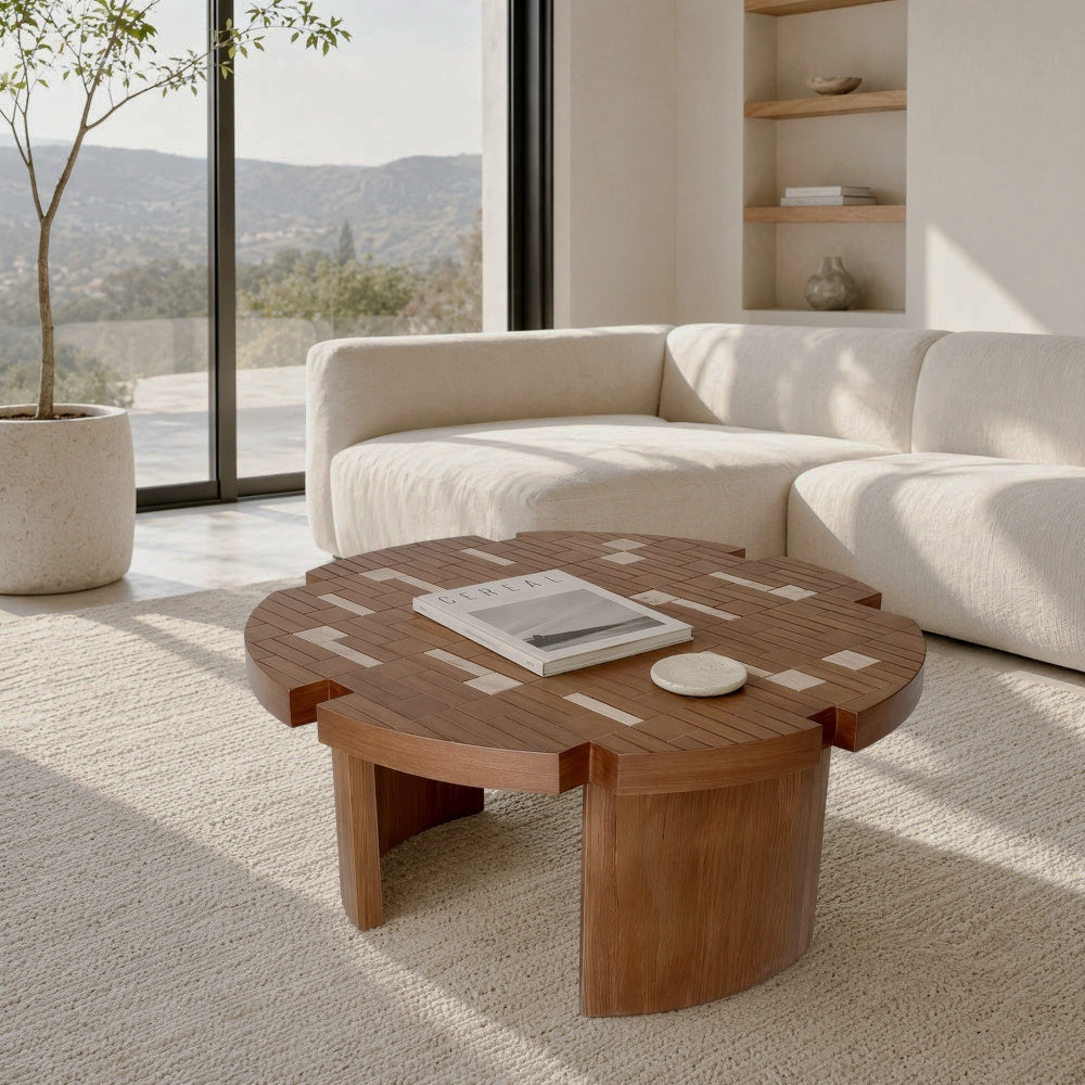 Brown petal-shaped coffee table beside a white sofa