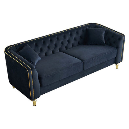 Black tufted sofa with two seat cushions, elevated angled view