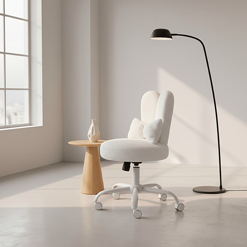 White bunny ear vanity chair with a bow cushion and white rolling base