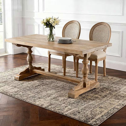 French style dining chair with a woven rattan back and beige upholstered seat