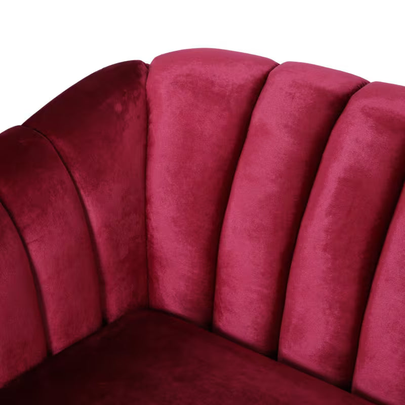 Wine Red Channel-Tufted Sofa — upholstery and flared arm detail.