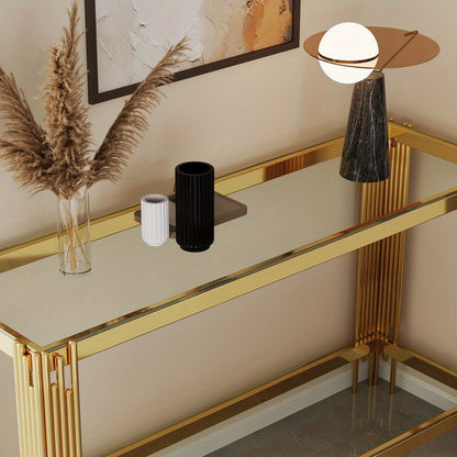 High angle showing the reflective glass console top with decorative accessories