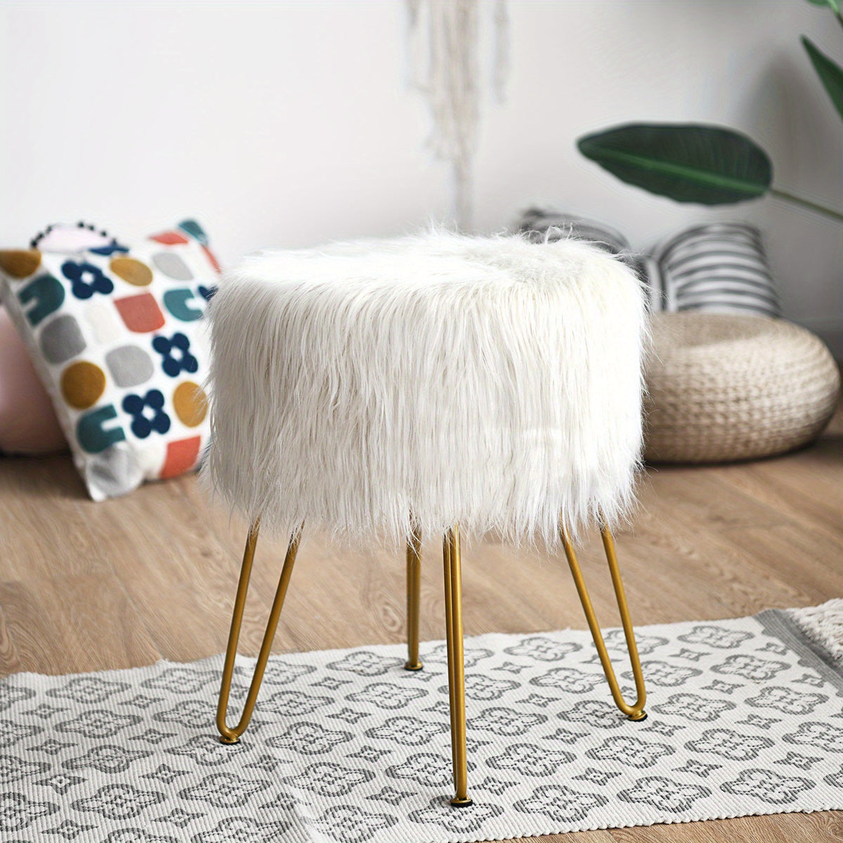 White faux fur ottoman styled beside a sofa