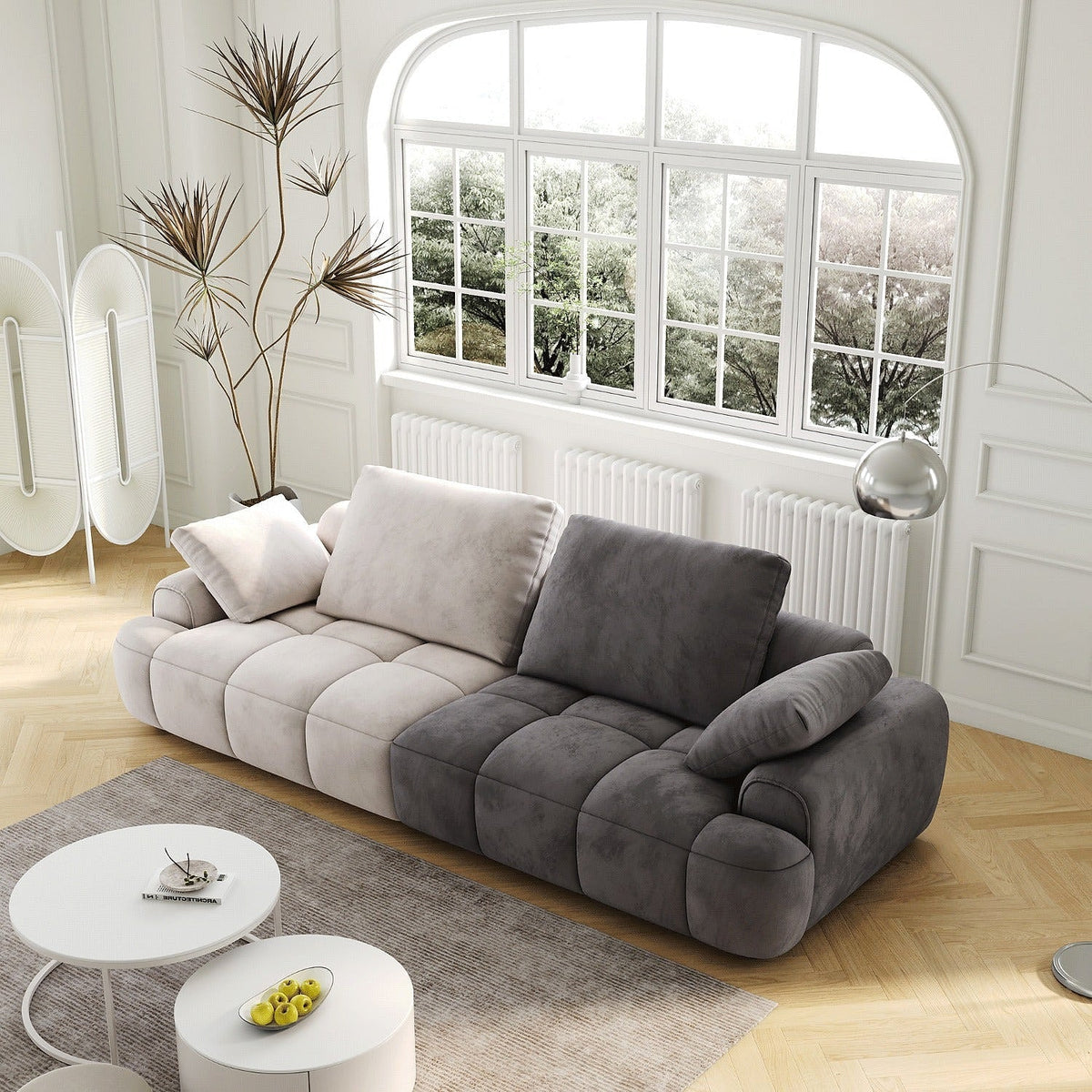 Remy Two-Tone Two-Seat Sofa — three-quarter view in a bright living room