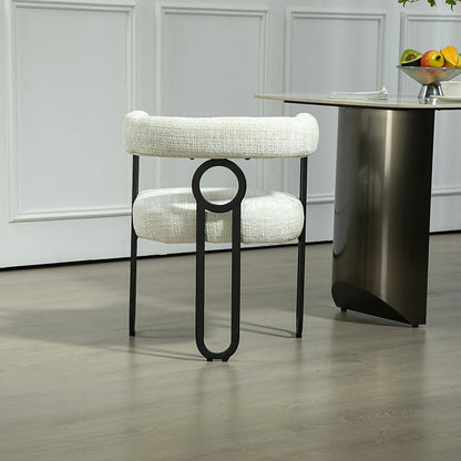 Beige chenille dining chair with a black metal loop frame