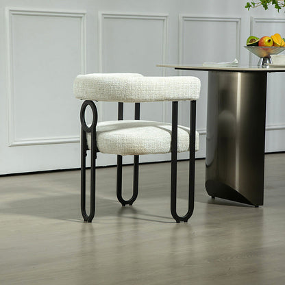 Beige chenille dining chair with a black metal loop frame