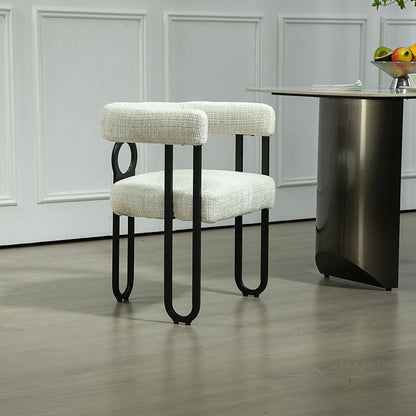 Beige chenille dining chair with a black metal loop frame