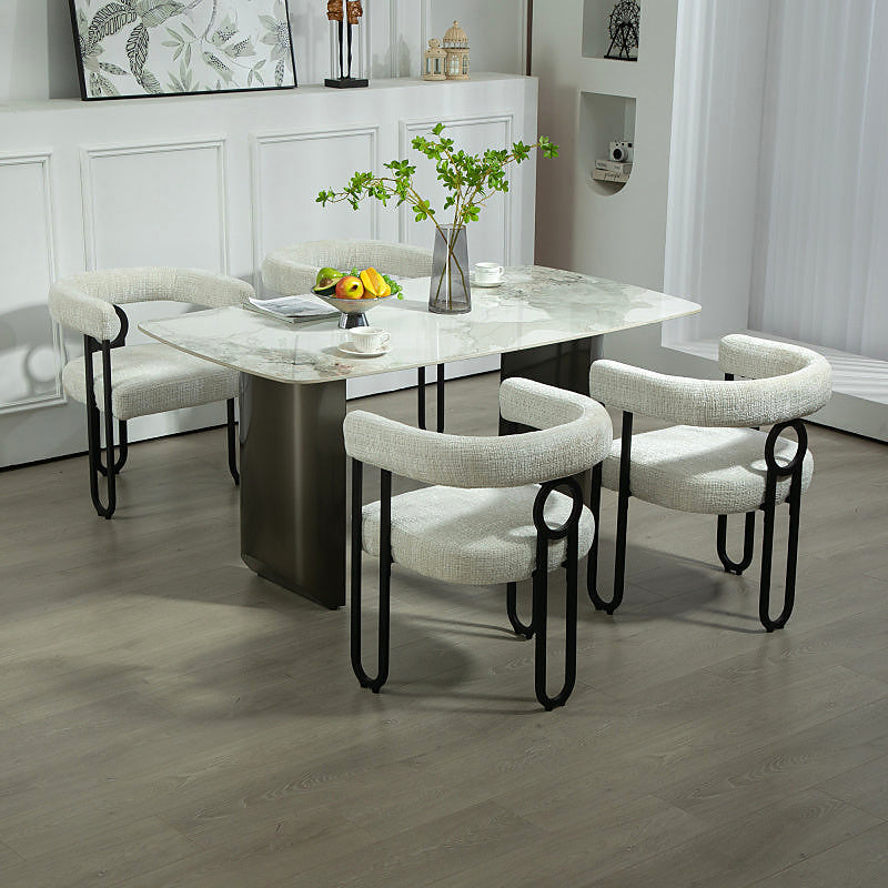 Beige chenille dining chair with a black metal loop frame