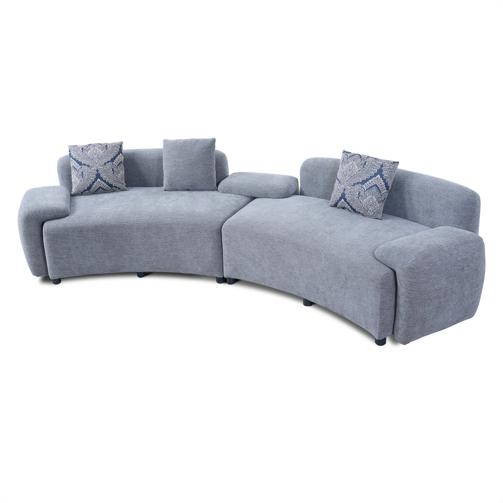 Blue-Grey Curved Sofa with Damask Pillows — angled product view of both modules.