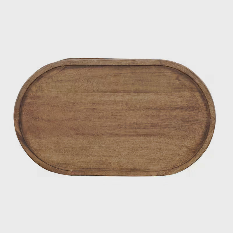 Overhead view of the oval brown coffee tabletop and raised rim