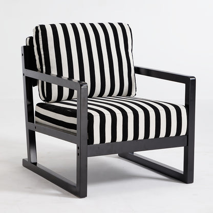 Black and White Striped Wood-Frame Lounge Chair — front three-quarter view on a pale background