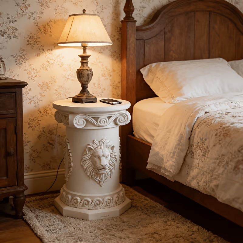 White lion-relief resin side table beside a bed in a classic room.