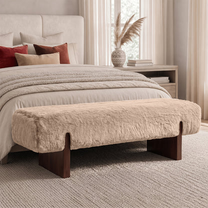 Faux Fur Upholstered Bench with Wood Legs — beige bench at the foot of a bed.