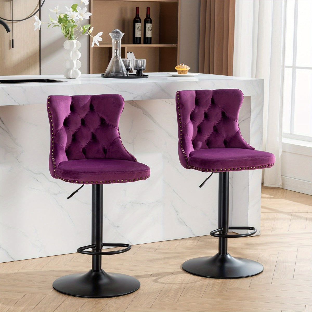 Two purple velvet swivel bar stools at a kitchen island