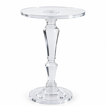 Clara Acrylic Accent Table — clear round tabletop, faceted pedestal and circular base, full studio view on white