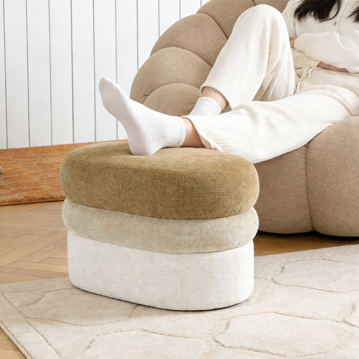 Ombre ottoman used as footrest