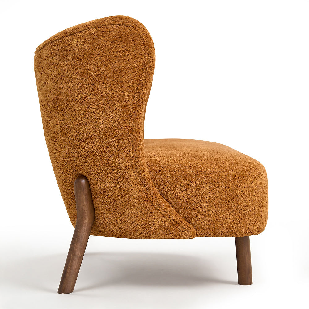 Side profile of the caramel chenille loveseat showing the curved upholstered back and angled wood legs.