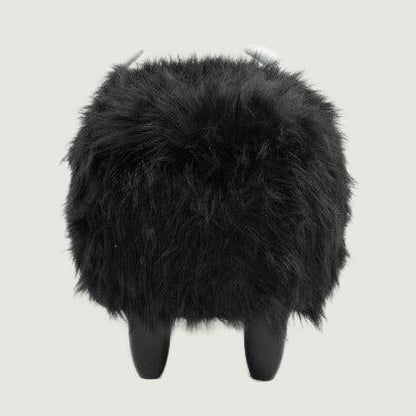 Harry Black Buffalo Storage Ottoman — complete rear view on a light neutral studio background