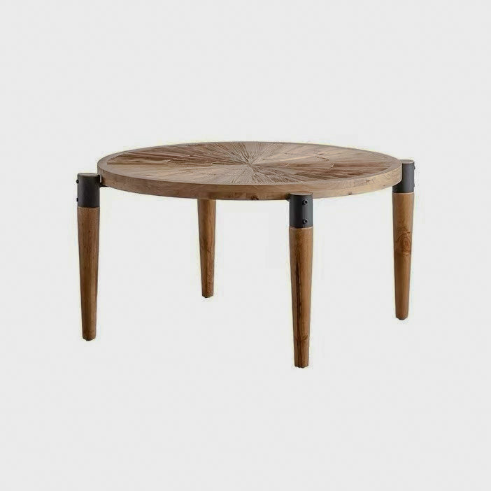Round coffee table with tapered legs isolated on white