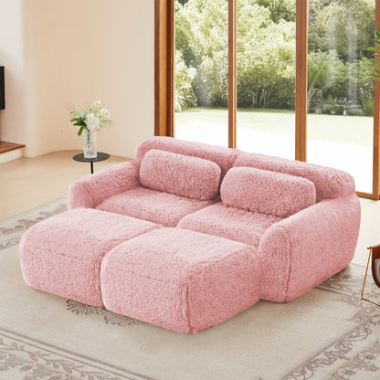 80-Inch Plush Deep-Seat Sofa with Footrests — pink sofa and front footrest sections in a room