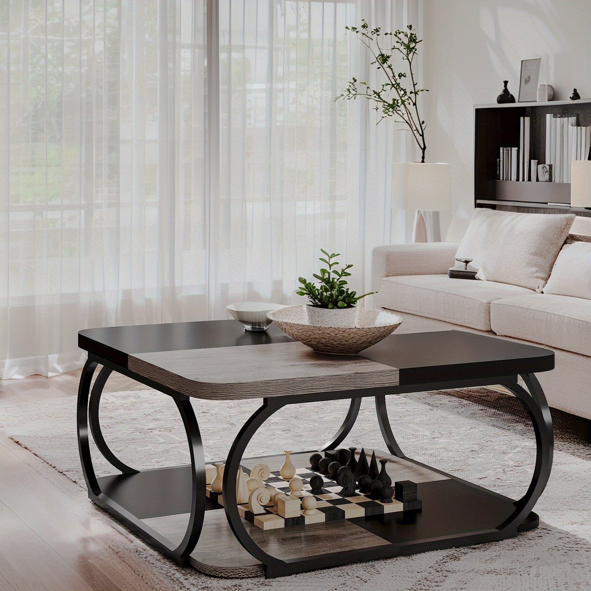 Gray-and-black square coffee table with curved frame and lower shelf