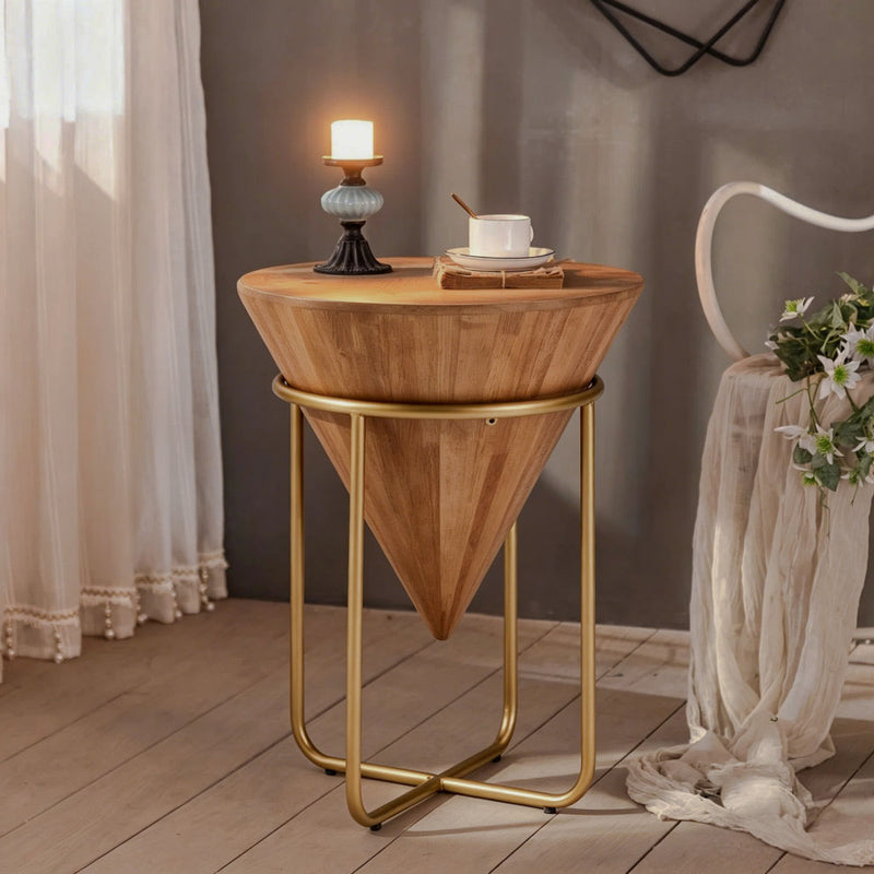 Cone side table styled with a cup beside a chair and curtains.