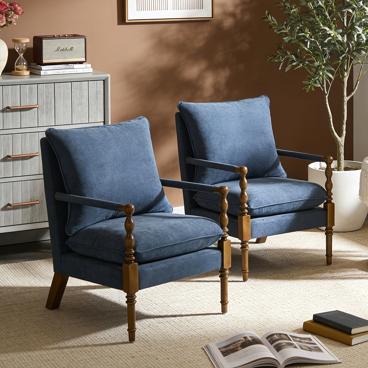 Blue upholstered accent chair with turned wood front posts