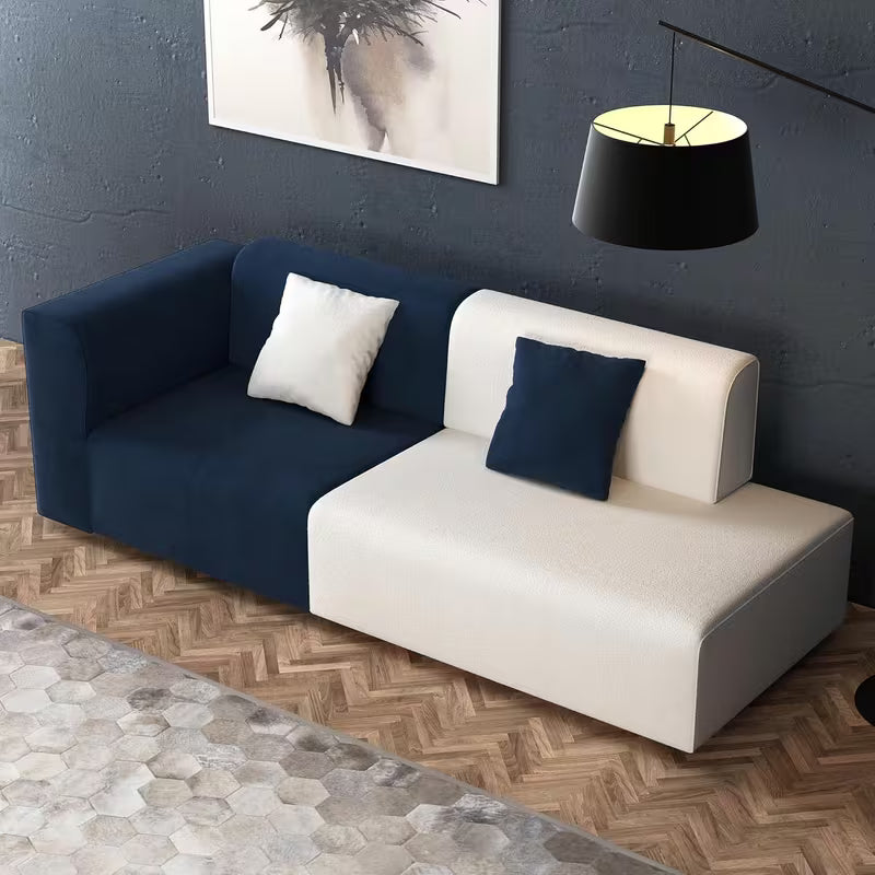 Navy and Ivory Color-Block Sofa — close angled view of the cushions.