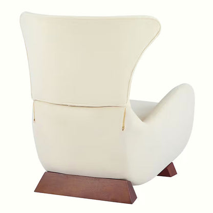 Beige sculptural upholstered accent chair with a curved wood frame and lower storage nook