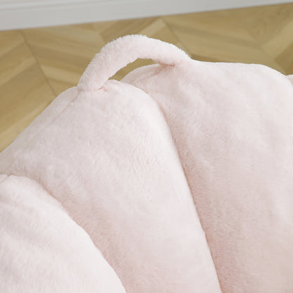 Seashell Faux Fur Lounge Chair with Footrest — faux fur backrest and pillow close-up.