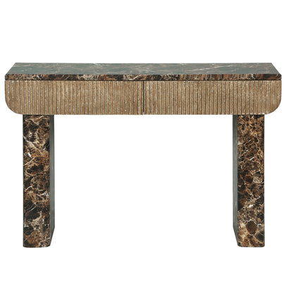 Front view of the dark veined console with two fluted drawers and slab legs.
