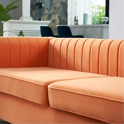 Vertical upholstery channels on the orange sofa