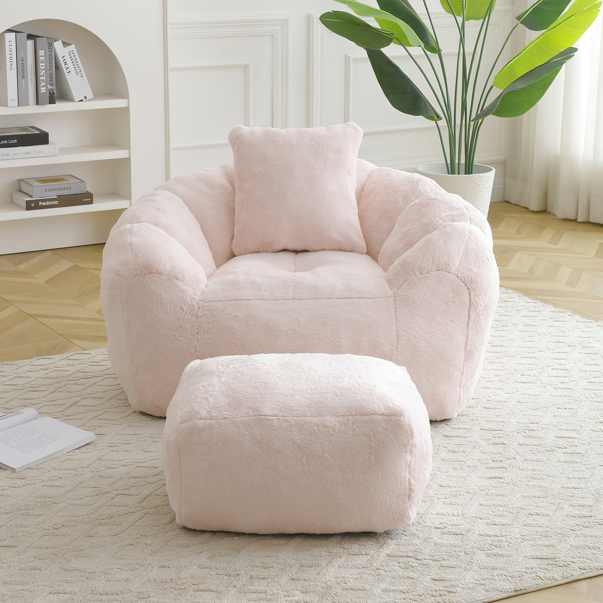 Seashell Faux Fur Lounge Chair with Footrest — pink chair and footrest from the front.