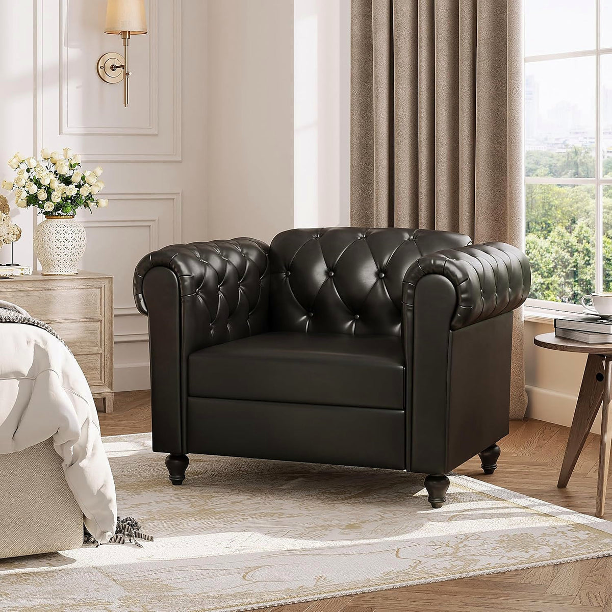 Black faux leather Chesterfield club chair with rolled arms and turned wood feet