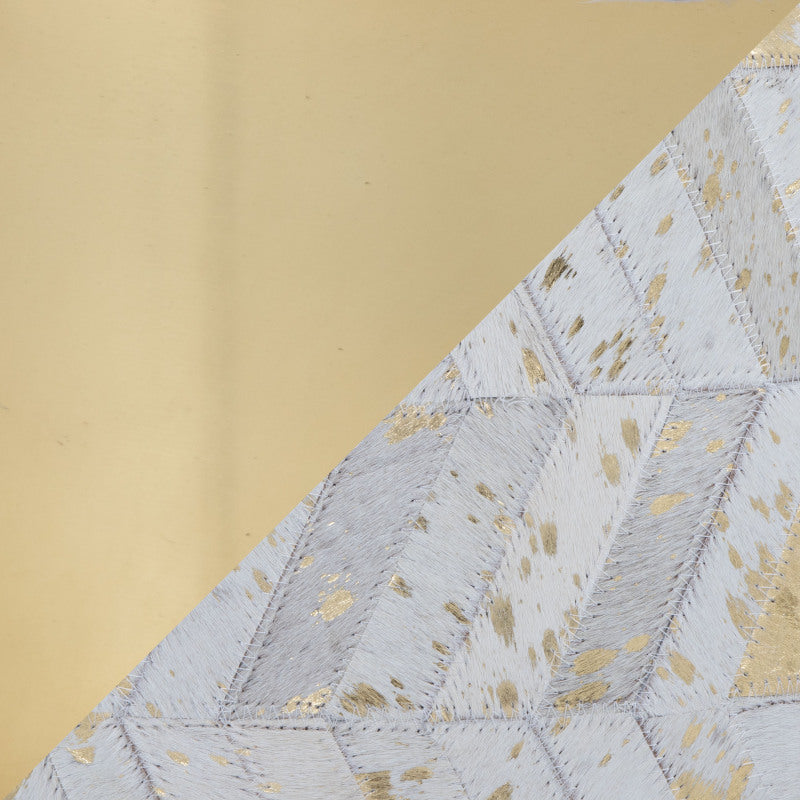 Ivory and Gold Chevron Leather Ottoman — gold accent and ivory chevron surface close-up