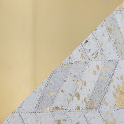 Ivory and Gold Chevron Leather Ottoman — gold accent and ivory chevron surface close-up