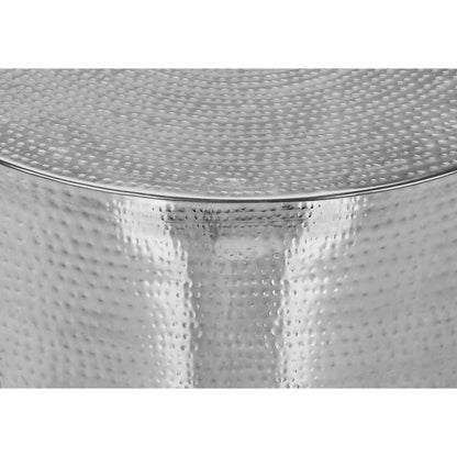 Close-up of the hammered chrome tabletop, rim and upper side of the drum accent table.