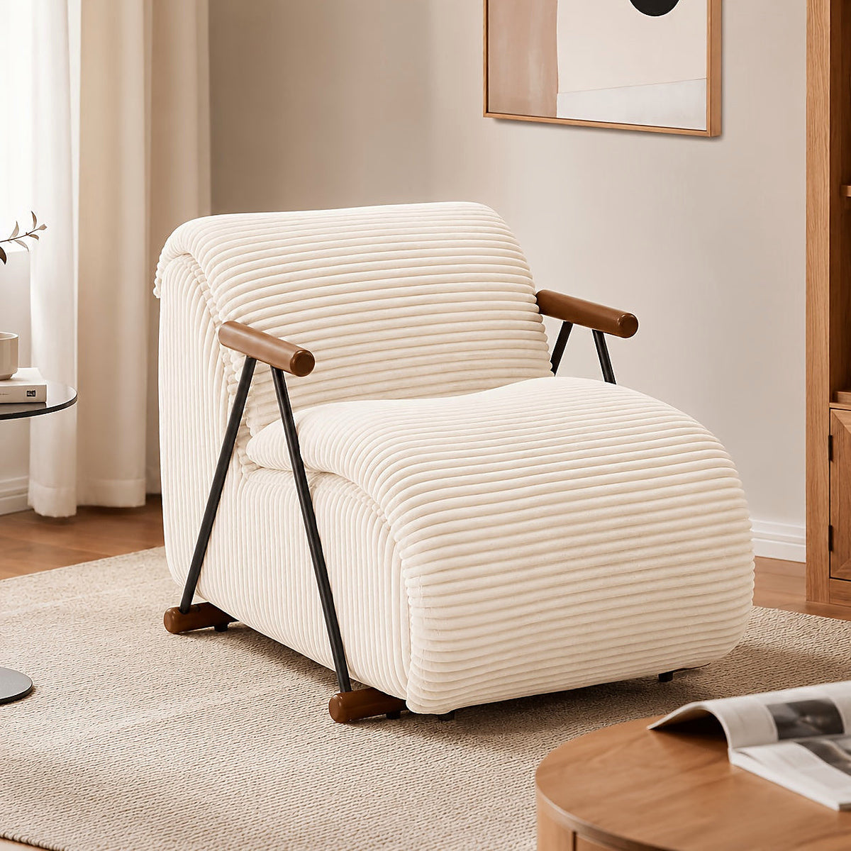 Beige wide corduroy lounge chair with wood arms and a black metal frame