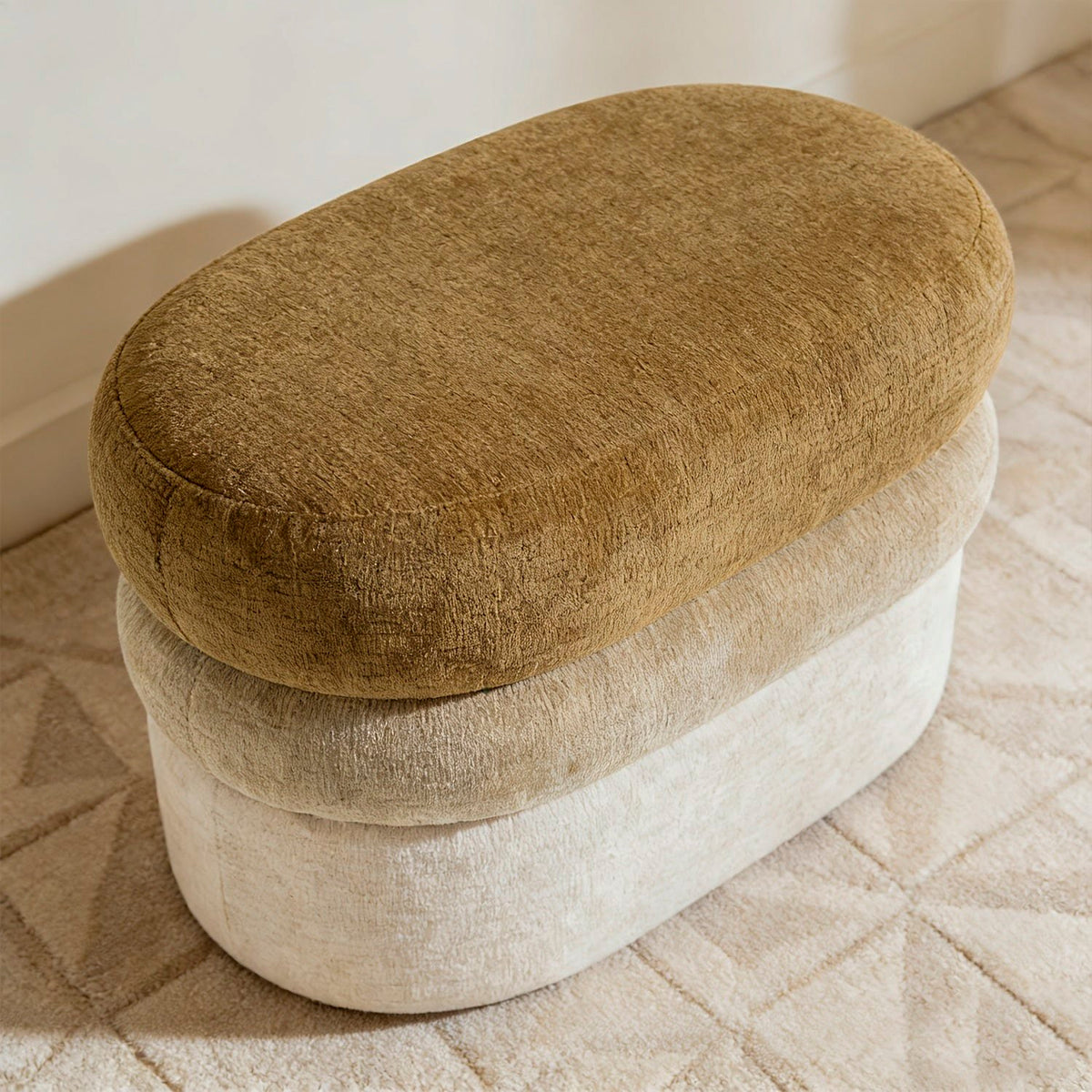 Tan-and-cream ombre oval ottoman viewed from above