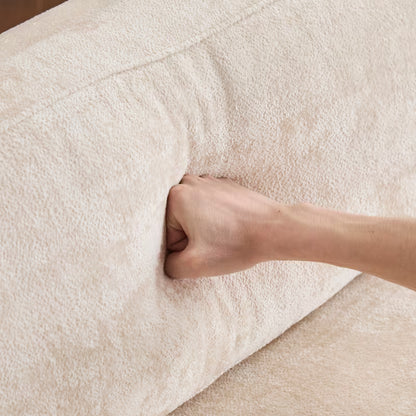 Square-Arm Boucle Sofa with Wood Base — back cushion compression demonstration.