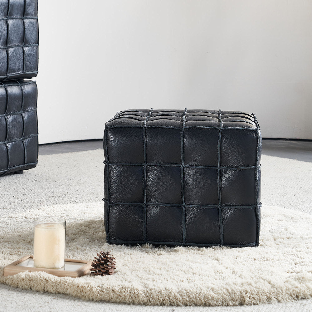 Square Tufted Ottoman — front three-quarter view of the black ottoman