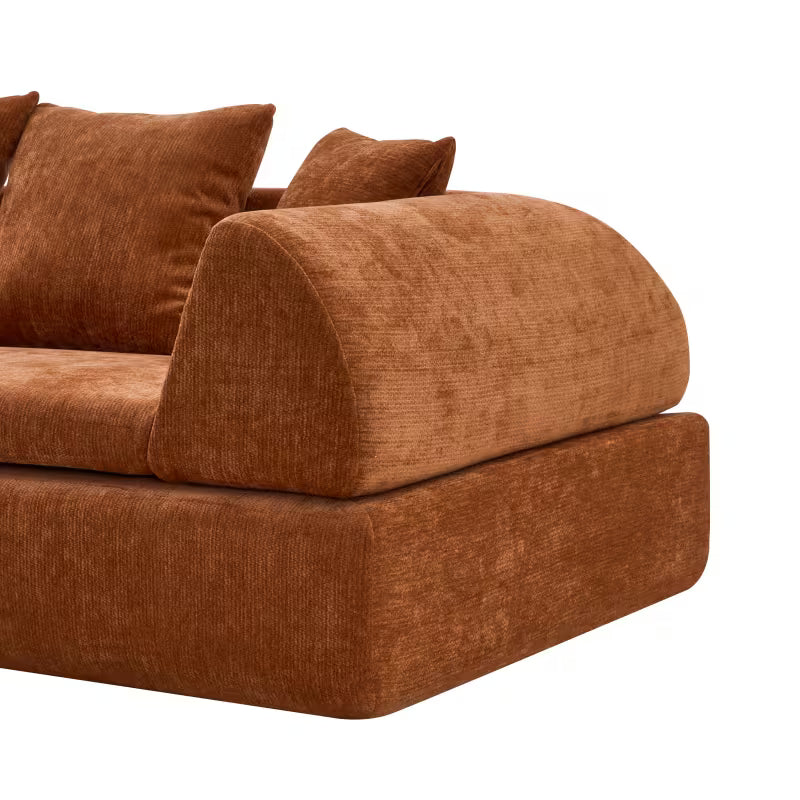 Close-up of the sofa's rounded upholstered arm